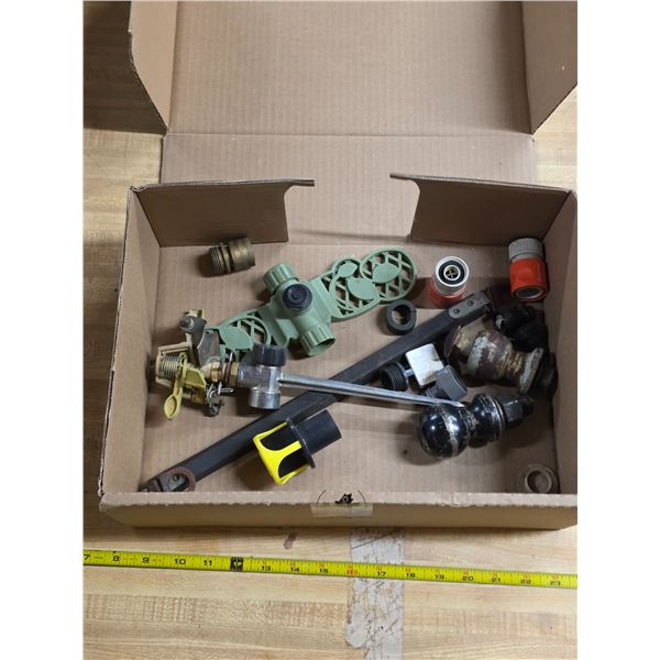 Lot of trailer balls and lawn sprinkler attachments
