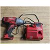 Image 1 : 1/2 milwaukee impact driver with charger- no battery