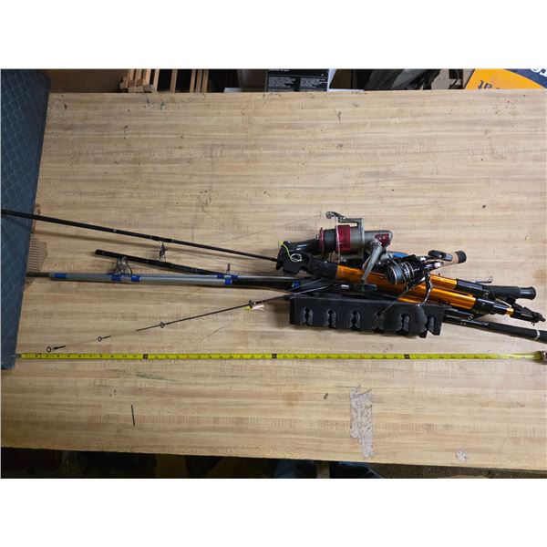 3 fishing rods- various different reels and sizes