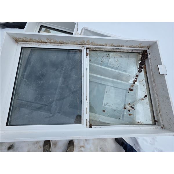 Dual pane sliding window- dirty and mirror damage- 62" by 38"H