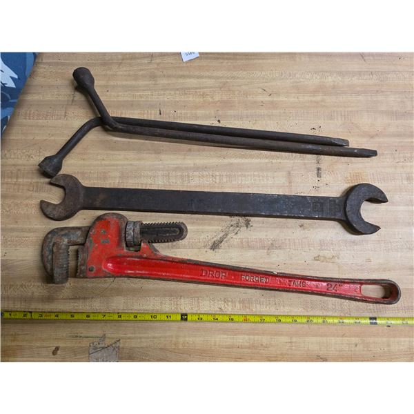 2 large wrenches and tire irons