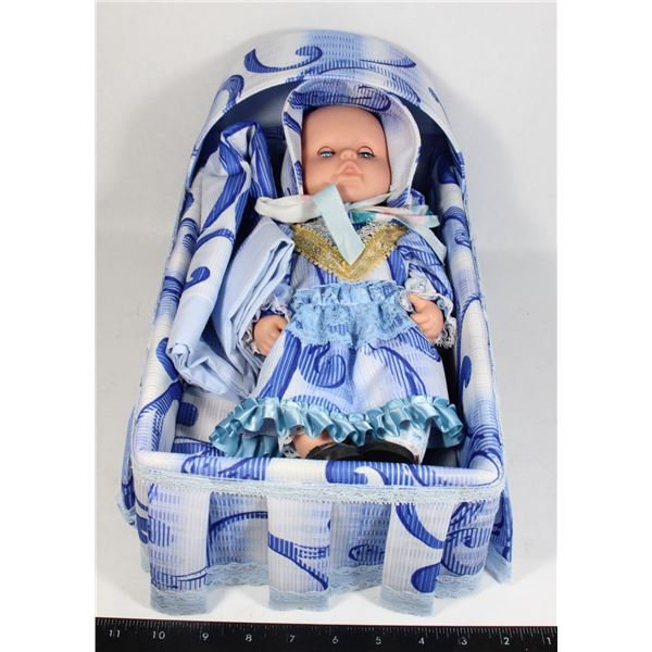 VINTAGE TOY DOLL IN CRIB