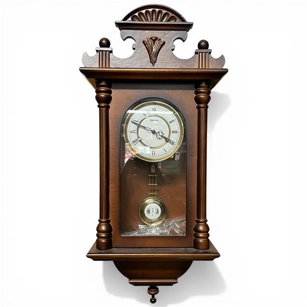 Hermle Wood Cased Pendulum Wall Clock (6" x 10" x 34" tall)