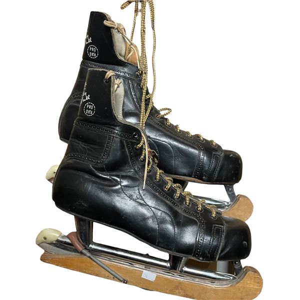 Pair of Vintage Leather CCM "Bobby Hull" Skates with Wood Skate Guards (Size 10)