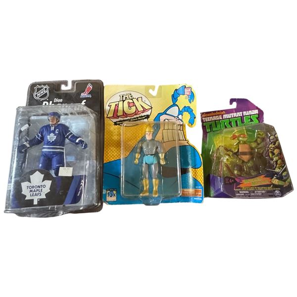 Toronto Maple Leafs Dion Phaneuf, the Tick "Projectile" and TMNT Michealangelo Action Figures