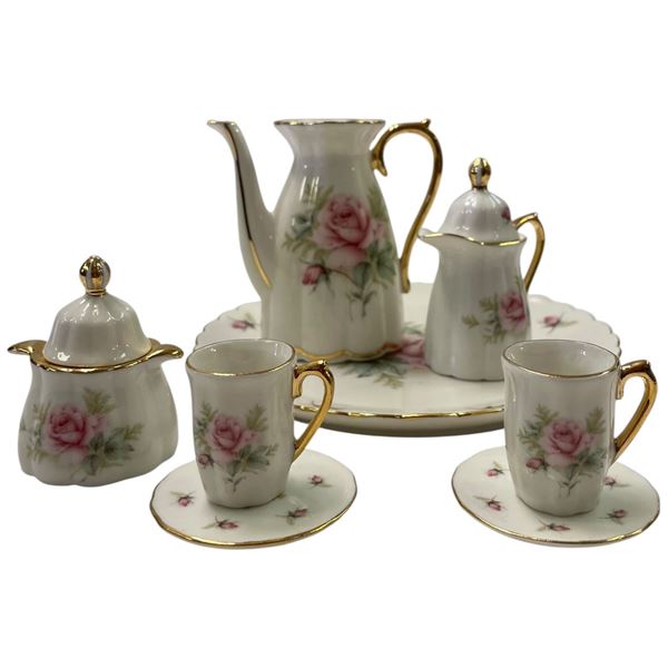 Child's China Tea Set for Two and an Opalescent Apple