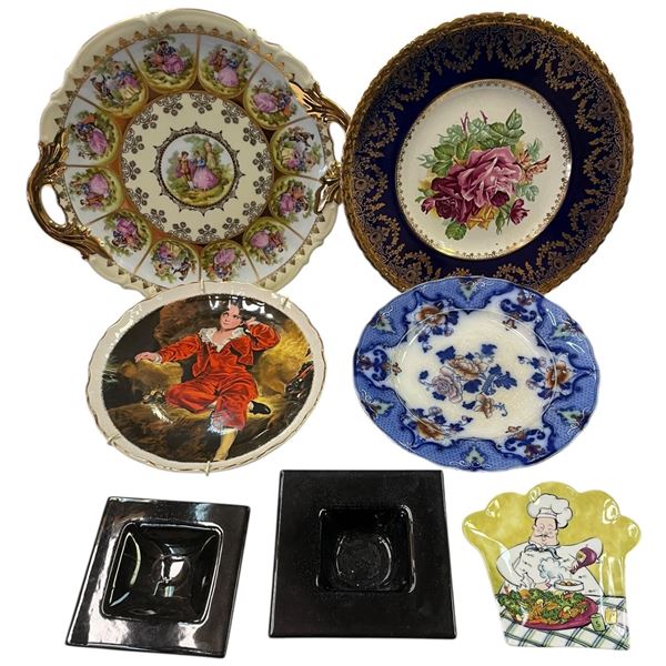 Stack of China and Glass Plates with a Ceramic "Chef" Spoon Rest