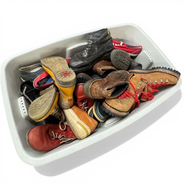 Large Bin Filled with Assorted Boots and Shoes