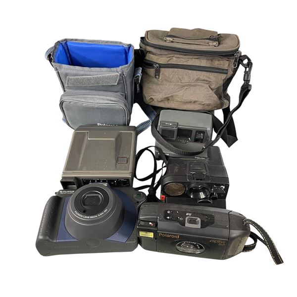 5 Polaroid Cameras