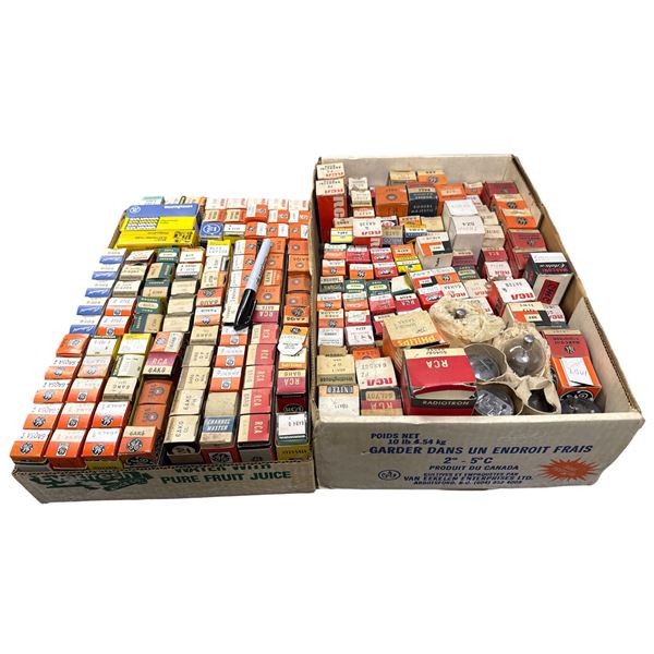 Large group of assorted vintage vacuum tubes in boxes