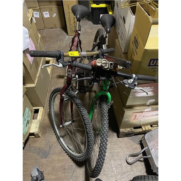 2 Mountain Bikes and 6 Assorted Hockey Sticks