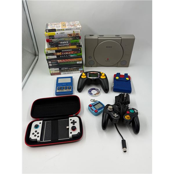 Video Game Lot w/ PlayStation, Assorted Video Games, Controllers, & More