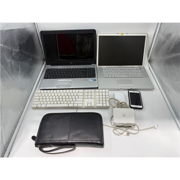 Electronics Lot w/ 2 Laptops, Keyboard, iPhone, & Assorted DVDs
