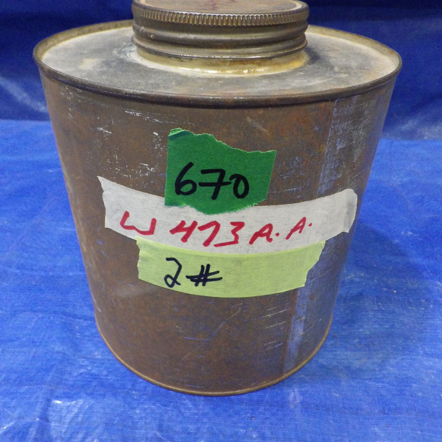 CAN OF POWDER from an estate. Total weight noted is for container and ...
