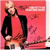 Image 1 : Tom Petty & The Heartbreakers signed  Damn The Torpedoes