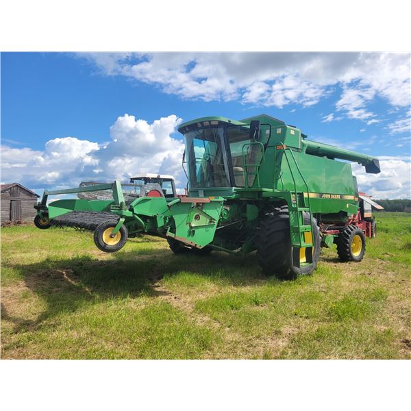 John Deere 9600 combine, 4310 eng. Hrs., 2991 separating hrs., 30.5L/32 frt. Rubber & 14.9/24, 5 ply