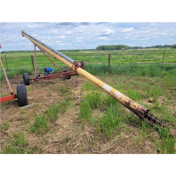 Westfield 40 ft auger, gas driven, powerfist motor, has not run for 2 years, SN. 36707. Located at 2