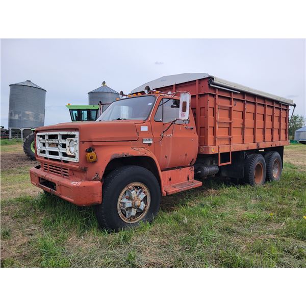 GMC 6500 Grain Truck, 6 spd,V8 standard gas engine, showing 93,123 miles, steel box & wood floor, VI