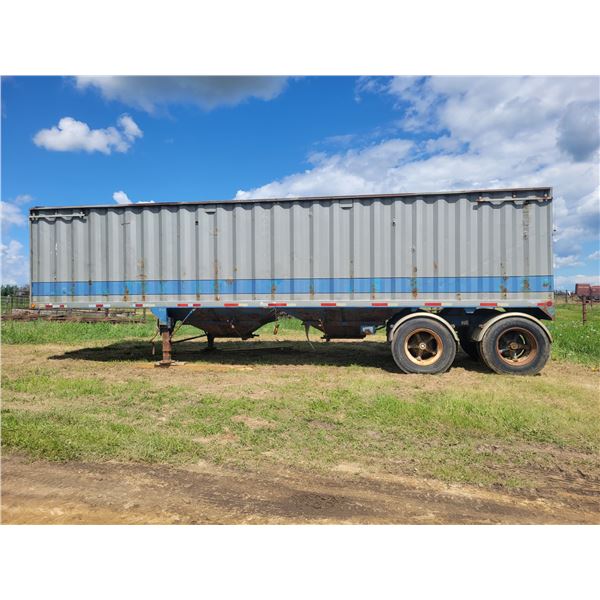22 ft Super B grain trailer. Has rust, holds grain. Roll top and 32ft Super B trailer, needs work ,