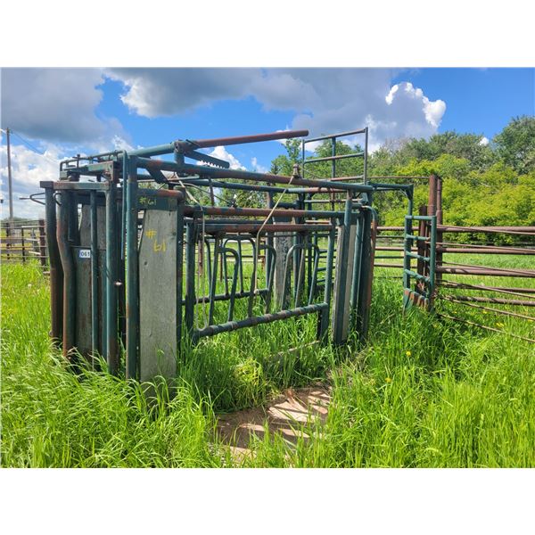 8ft cattle squeeze chute w. 36" entry gate. Located at 23012 Twp 604, North West of Thorhild. Viewin