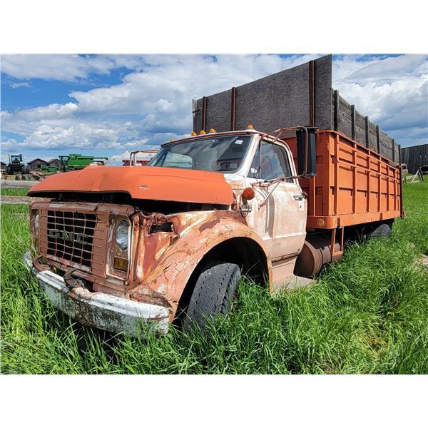 6500 GMC Grain truck, steel box, V8 gas, 10.00-20 tires. Approx 16ft box w/ wood floor & double pist