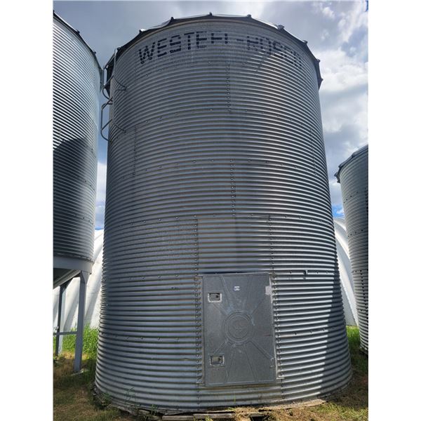 Westeel Rosco 7 ring flat bottom grain bin. The Estate of Clarence Ewasiw, Located at 23012 Twp 604,