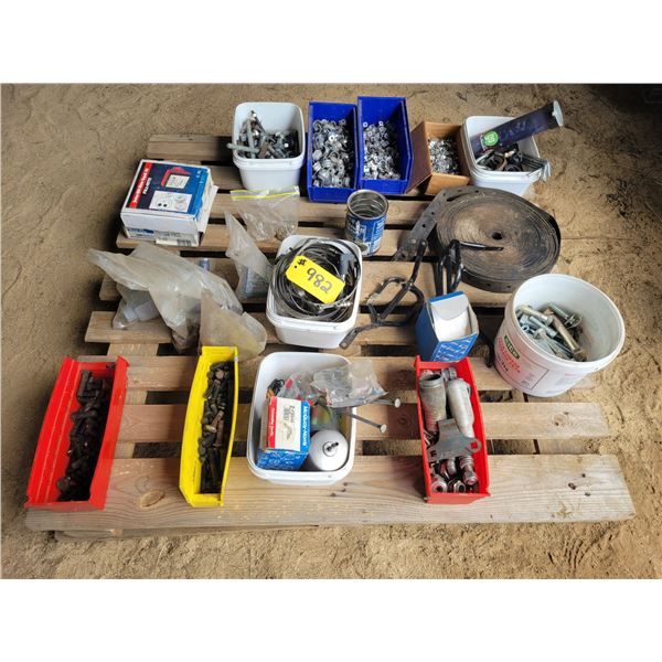 Hose clamps, conduct clamps, misc. nuts, bolts, casket grainary material.   Located at 23012 Twp 604
