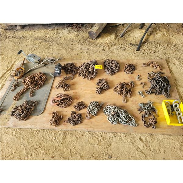 Qty of assort chains, crevices.   Located at 23012 Twp 604, North West of Thorhild. PH Gloria (780)