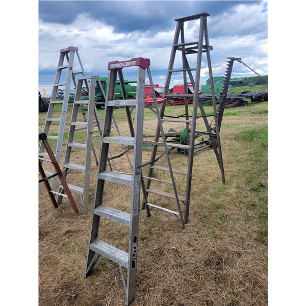 Two ladders- one 6ft alum.  , one 10ft wooden.   Located at 23012 Twp 604, North West of Thorhild. P