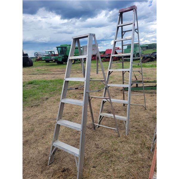 Two ladders- one 6ft aluminum, one 10 ft aluminum.   Located at 23012 Twp 604, North West of Thorhil
