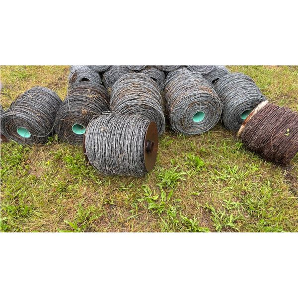 Barb wire fence rolls- 6 new rolls, one with a small amount,  one used roll. Approx 2ft tall rolls.