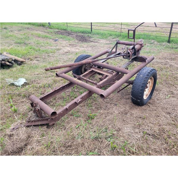 Homemade pull type PTO driven wire puller, needs repair.   Located at 23012 Twp 604, North West of T