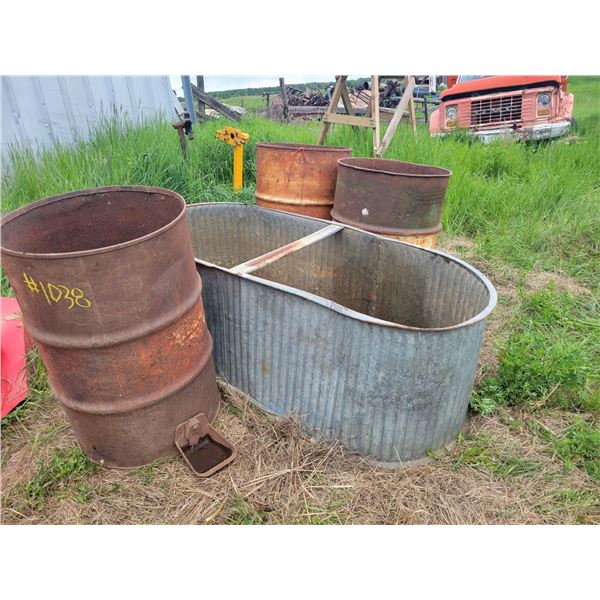 Galvanized stock tank, 3- metal barrels without lids.   Located at 23012 Twp 604, North West of Thor