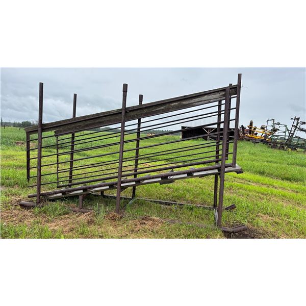 Homemade cattle chute c/w pressure treated ramp. 3 ft. wide x 12 ft. long & approx. 41 inches from t