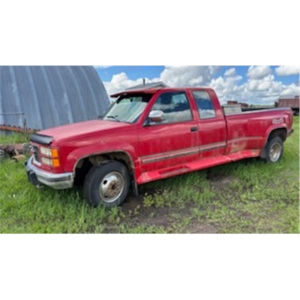1994 Red GMC Sierra 1-ton, ext. cab, dual wheels c/w tool box, steel plate, power windows/locks & 5t