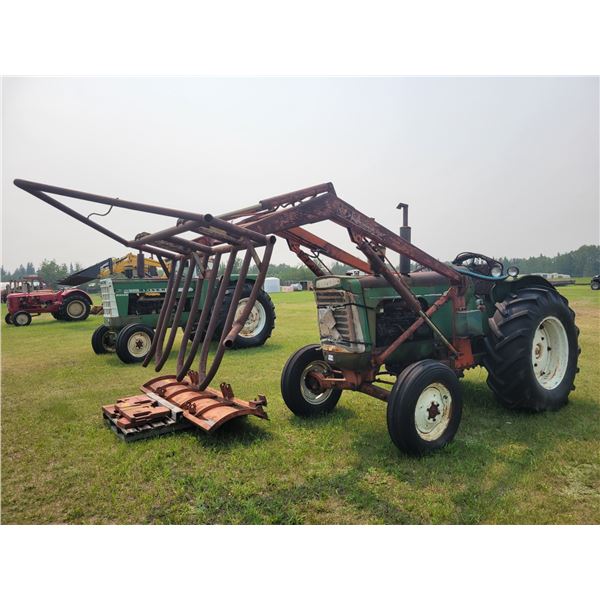 Oliver 770 diesel, c/w  Duzal front end loader, bucket, snowblade, 10 bale stooker forks, power boos