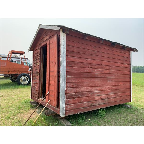 10 ft. 6 inch x 8 ft. 4 inch wood grainary, metal clad roof, c/w all bricks, plank shelving  Note: