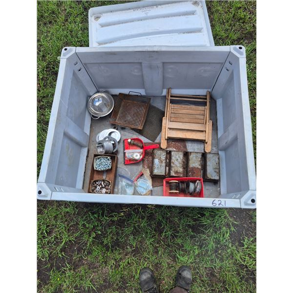Contents of plastic crate, leg bolts, washers, wire, hinges etc. Crate does not go