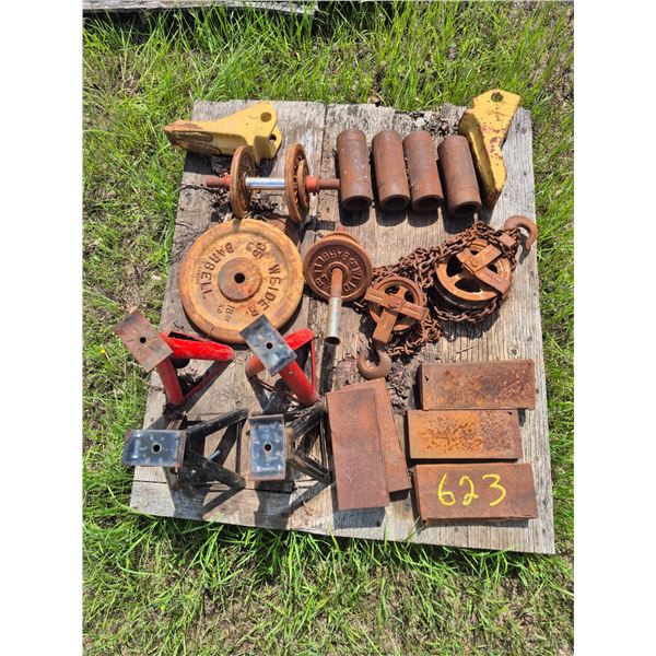 Pallet of 4 jack stands, nails, 1 ton com-a-long, bucket teeth, 8" collars, and partial weight set