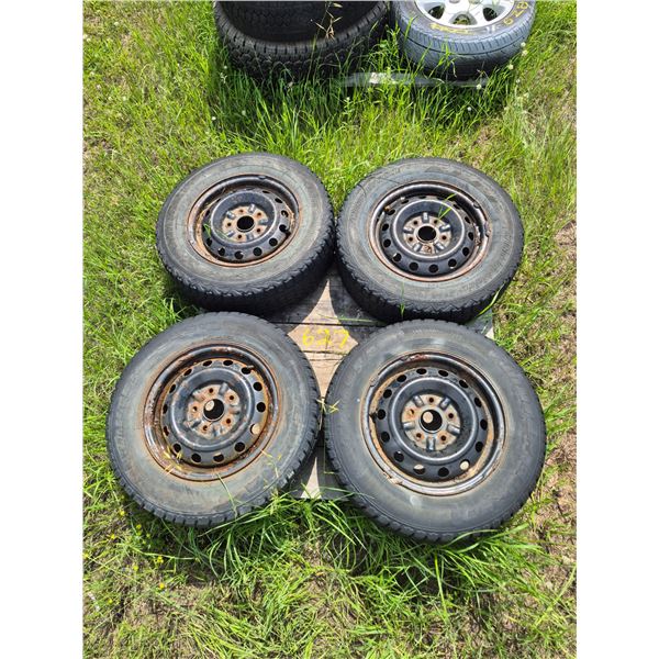 4 Winter force 195/70/R14 tires, c/w 5 hole rims