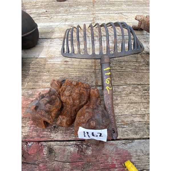 3 stove legs, and 1 coal fork