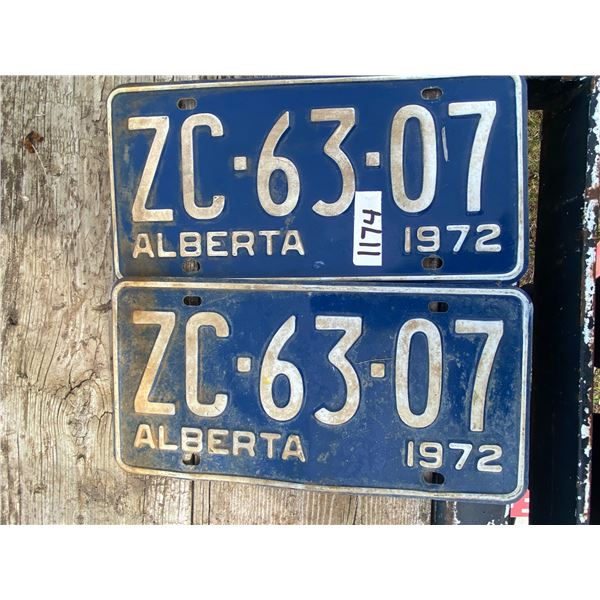 2 blue 1972 plates, selling together