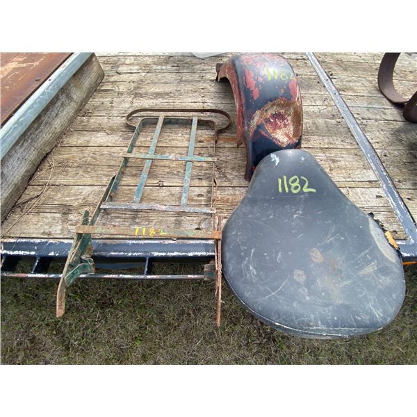 Motorbike seat, fender, and green rack