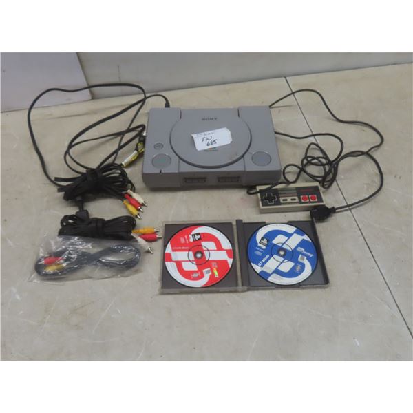 Sony PlayStation with Controller, Power Cord, RCA Jacks and 2 Games