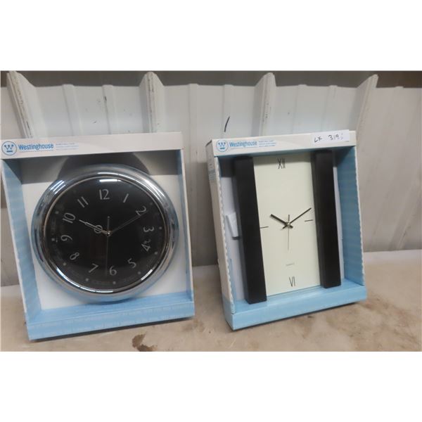 2 New Westinghouse Quartz Wall Clocks