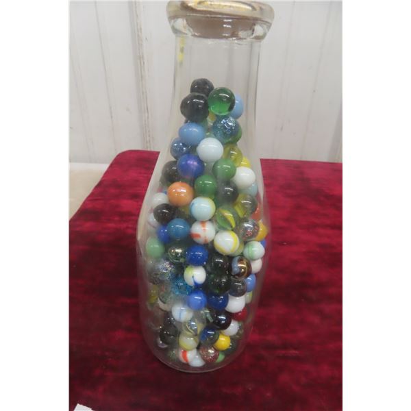 Cream Bottle Full of Marbles