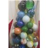 Image 2 : Cream Bottle Full of Marbles