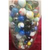 Image 3 : Cream Bottle Full of Marbles