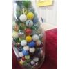 Image 4 : Cream Bottle Full of Marbles