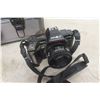 Image 4 : 3 Cameras: Minolta 7000, X-700, 5000 with Extra Lenses, Flashes & Case 